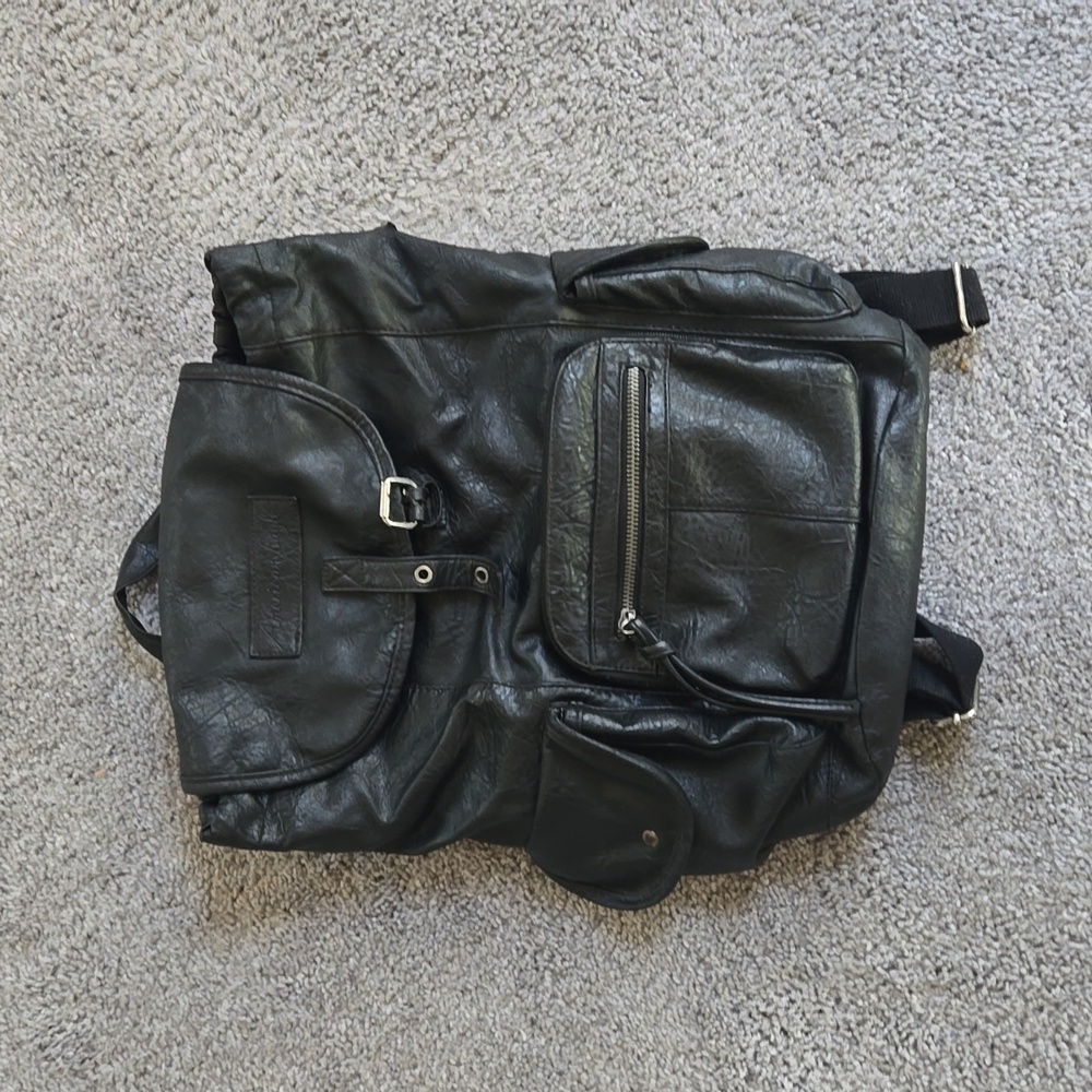 Black Vinyl American Eagle Backpack with Drawstring. Black/White floral inside